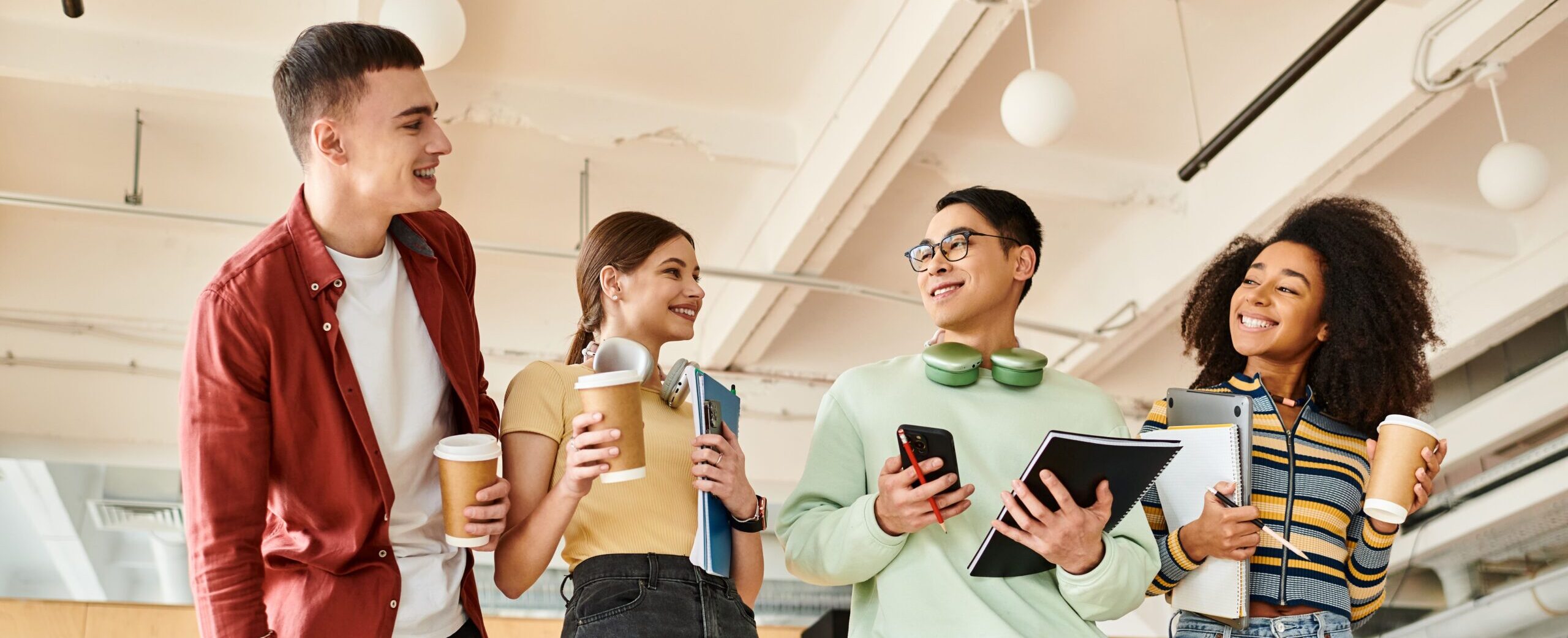 group of smiling teens or young adults